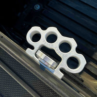 Silver Truck Knucks CNC machined billet aluminum tie-down truck bed accessories in bed rail of Toyota Tacoma